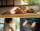 A naked woman laying on top of a wooden table.